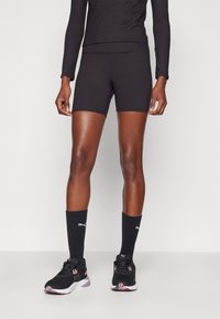 Puma - TRAIN SHORT - Leggings - black Thumbnail Image 1