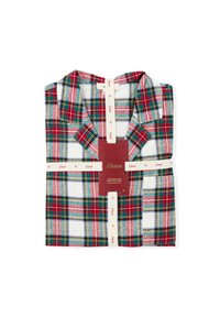 Chemise à carreaux rouge et blanc avec des accents verts, dotée d'un col, de manches courtes et d'une étiquette de marque avec des instructions d'entretien. Le matériau semble doux.