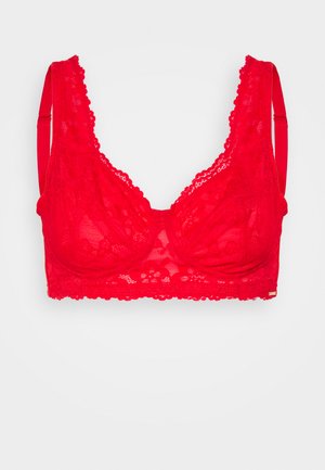 Piros csipkebralett, mély dekoltázzsal, fodros szélekkel és vékony állítható pántokkal. Puha virágmintázat az egész felületen.