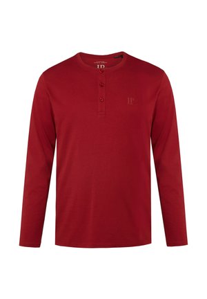 Langärmliges rotes Hemd aus Baumwolle mit Rundhalsausschnitt, dreiknöpfiger Leiste und subtilen Logodetails auf der Brust. Glatte Textur.