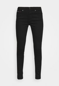 Jeans ajustados negros de tela de algodón, con un diseño de cinco bolsillos, cierre de botón metálico y un ligero estiramiento para mayor comodidad.