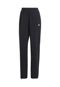 Schwarze Trainingshose mit elastischem Bund, Seitentaschen und einem kleinen weißen Logo in der Hüftgegend. Glatter, leichter Stoff.