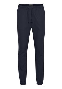 Marineblauwe joggingbroek van zachte stof met een elastische tailleband en verstelbaar trekkoord. Voorzien van elastische boorden bij de enkels.