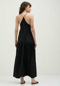 Calliope LUNGO CON ARRICCIATURE - Vestito lungo - nero