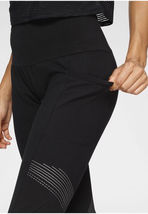 Leggings - Trousers - schwarz