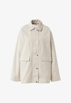 Beige jacket with a corduroy collar, snap front closure, two front pockets, and a loose fit design. Made from durable fabric.