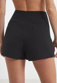 Calliope TINTA UNITA - Shorts - nero