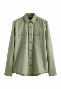 Green long-sleeve shirt made of soft fabric, featuring two front pockets, black buttons, and a pointed collar with yoke detailing.