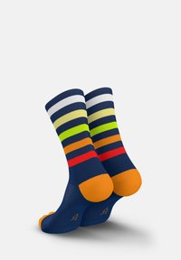 Navy blue socks with horizontal stripes in white, yellow, green, orange, and red; orange soles; smooth texture; non-slip design.