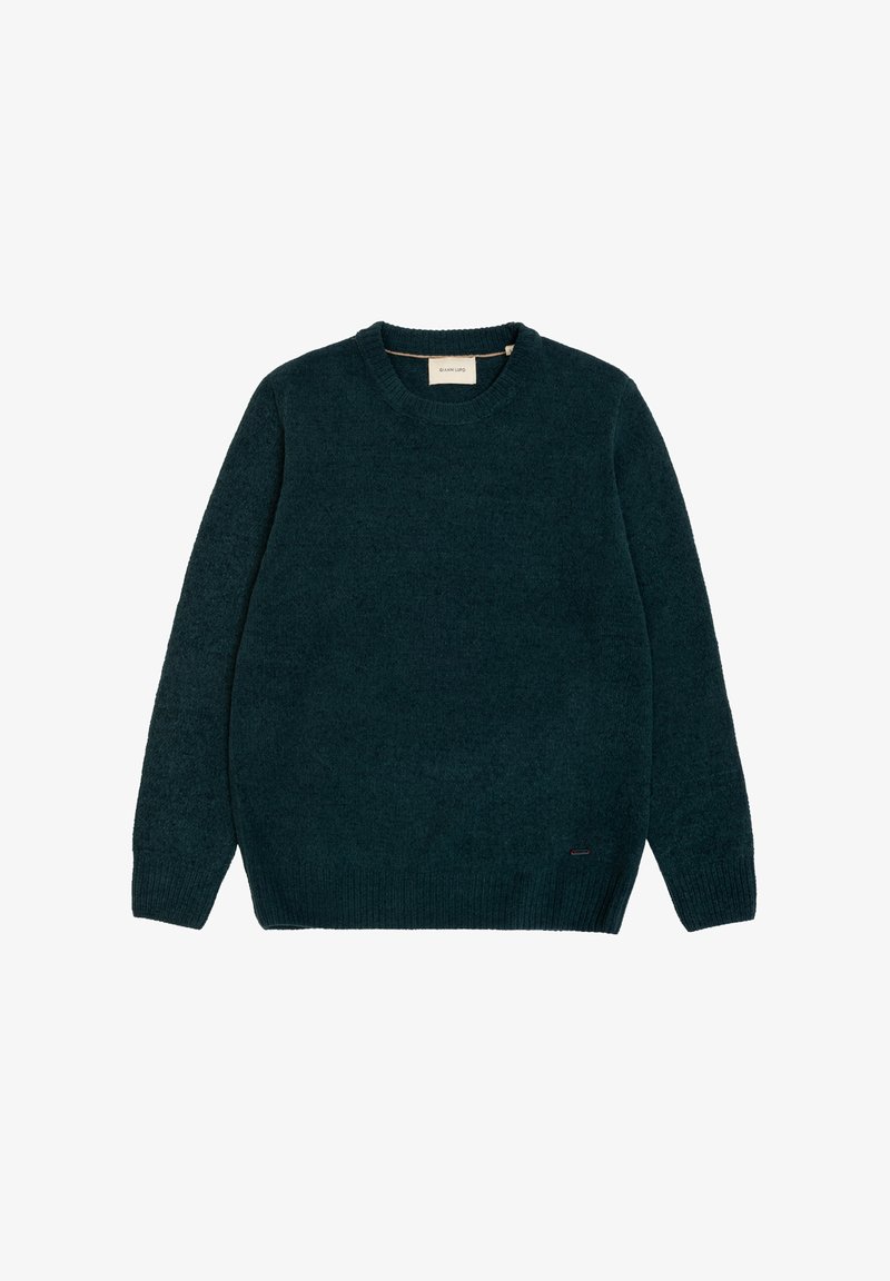 Gebreide crewneck trui in donkerteal. Zachte, gestructureerde stof met ribbelmanchetten en zoom. Heeft een klein logo-accent aan de onderzijde.