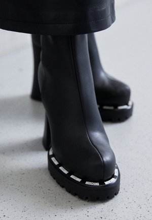 Bottines à plateau - nero