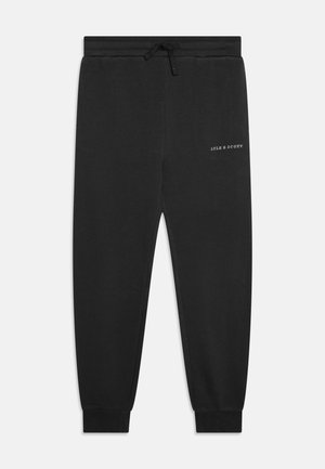Czarne dresy wykonane z miękkiego materiału, z elastycznym pasem na gumkę i ściąganymi mankietami. Na przodzie biały logo "LYLE & SCOTT".