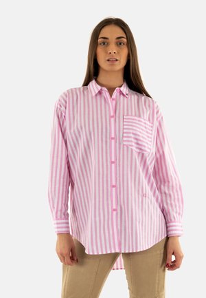 Pink and white striped button-up shirt, long sleeves, single chest pocket, with a curved hem and hidden button-down collar.