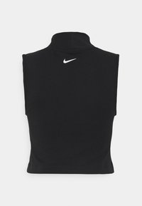 Čierny bezrukávový top s imitovaným golierom, vyrobený z mäkkej látky, s malým bielym logom Nike na chrbte. Jednoduchý, moderný dizajn.