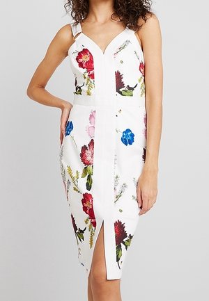 Sleeveless white midi dress with colorful floral prints, fitted silhouette, V-neckline, and front slit.