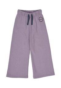 Lila weite Hose aus weicher Baumwolle. Sie verfügt über einen elastischen Bund mit Kordelzug und einem kleinen Druckdetail an einem Bein.