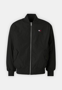 Černá bomber bunda vyrobená z hladkého materiálu, s předním zipem, žebrovanými manžetami, dvěma bočními kapsami a malým logem na prsou.