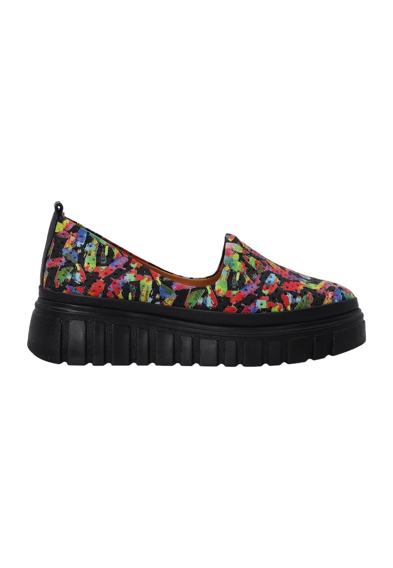 Slip-on shoes featuring a multicolored abstract pattern on a fabric upper, with a thick black rubber sole and textured detailing.