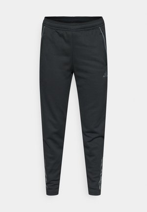 Pantaloni de trening atletici negri, realizați dintr-un material moale, cu un design conic, talie elastică și accente laterale reflectorizante.