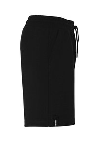 Zwarte shorts van zachte stof, met een elastische tailleband met een trekkoord, zijzakken en een klein logotag aan de zoom.