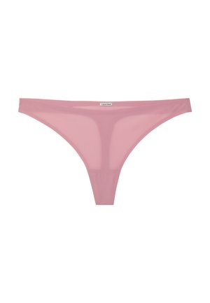 Culotte string rose pour femmes Calvin Klein avec un design lisse et sans coutures, et une petite étiquette logo au centre de la ceinture.