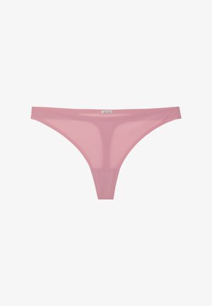 Roze Calvin Klein damesstring met een glad, naadloos ontwerp en een klein logotagje in het midden van de tailleband.