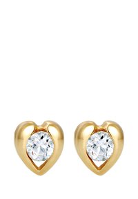 Boucles d'oreilles en forme de cœur en or avec des cristaux ronds transparents au centre, finition polie avec une texture lisse et des bords arrondis.