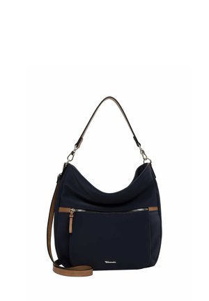 Navy blue soft fabric shoulder bag with a curved shape, brown leather accents, and a front zippered pocket. Features an adjustable strap.