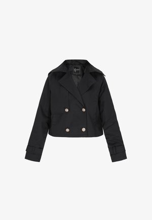 Rövidített fekete dzseki puha anyagból, ezüst gombokkal díszített, dupla soros elülső résszel és széles gallérral rendelkezik. Hosszú ujjak, mandzsettával.