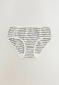 Slip in cotone a righe con sottili strisce navy su sfondo bianco, dotato di una morbida fascia elastica in vita e un piccolo dettaglio in nastro.