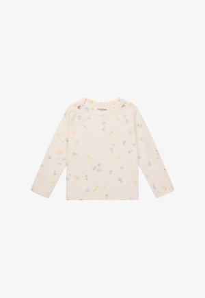 Long-sleeve shirt in light cream cotton, featuring a playful pattern of blue, yellow, and green leaves and circles, with snap closures on the shoulder.