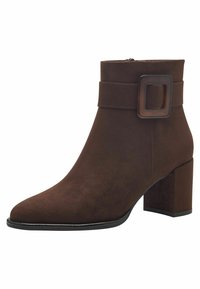 Brown suede ankle boot with a square toe, a chunky heel, and a decorative belt-style strap featuring a rectangular buckle.