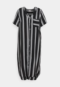 Koszula w paski w czerni i bieli, z dekoltem w serek, krótkimi rękawami, guzikami z przodu oraz kieszonką na piersi. Miękki materiał o luźnym kroju.