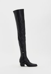 Knee-high black leather boots with a slouchy design, square toe, side zipper, and a curved, block heel. Smooth texture and minimal accents.