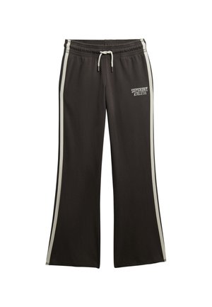Pantalons de survêtement larges noirs avec des rayures blanches sur les côtés, taille élastique, cordon de serrage et logo blanc "Superdry Athletic" sur la cuisse gauche.