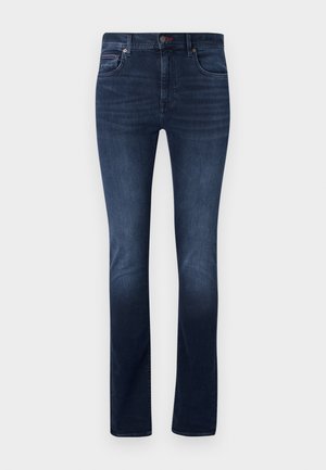 Mörkblå denimjeans med rak bendesign, med knapp- och dragkedjestängning, subtila blekningar och kontrasterande sömmar på fickorna.