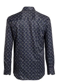 Navyblaues Langarmhemd mit floralen Mustern in hellbeige, verfügt über einen klassischen Kragen und Knopfmanschetten, hergestellt aus einem glatten Stoff.