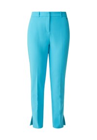 Pantalon court turquoise sur mesure avec plis plats à l'avant, passants de ceinture, fermeture avant invisible et petites fentes latérales aux ourlets.