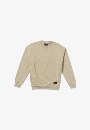 Felpa beige a girocollo con polsini e orlo a coste. Presenta una cucitura a V al collo e un'etichetta con logo sul lato sinistro in basso.