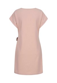 Light pink cotton dress with a loose fit, short sleeves, round neckline, and a tie accent at the waist. Smooth texture, simple design.