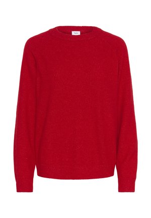 Czerwony sweter robiony na drutach z okrągłym dekoltem, długimi rękawami i miękką fakturą. Ma lekko luźny krój i ściągacze przy rękawach.