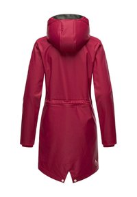 Red waterproof jacket with a hood, cinched waist, long sleeves, and a high-low hem. Features a smooth texture and logo detail near the hem.