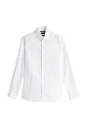 Witte lange mouwen button-up shirt van katoen, met een klassieke kraag, rechte zoom en subtiele stikdetails op de mouwen.