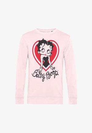 Jasnoróżowa koszula z długim rękawem z czarno-białą postacią Betty Boop na tle czerwonego serca oraz napisem „Betty Boop” poniżej.
