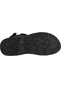 Mustasi nahkasaapas, jossa on kuvioitunut pohja, joka tarjoaa hyvän pidon. Ominaisuuksiin kuuluu etiketti, jossa lukee "WHISTLER" ja kohotetut uurteet parantamassa pitoa.