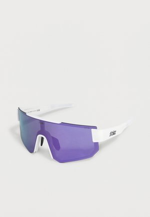 Lunettes de sport à monture blanche avec une grande lentille teintée violet et le logo « bliz » sur la branche.