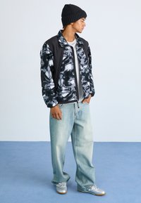 The North Face POLAR SUN JACKET - Jakna iz flisa - black liquid/black