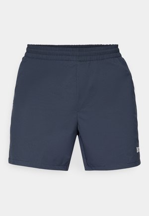 Marineblå svømmebukser lavet af letvægtsmateriale; har en elastisk talje og et lille logo-detalje i nederste højre hjørne.