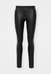 Zwarte leggings van glad, rekbaar materiaal met een hoge tailleband. Strakke pasvorm, naadloze constructie en geen zichtbare zakken.