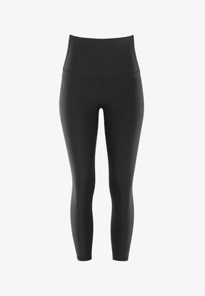 High-waisted black leggings made of stretchy, smooth fabric. Feature a fitted design, seamless edges, and a sleek silhouette.
